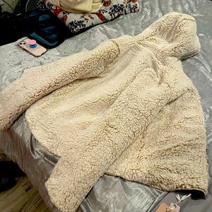 Reversible women’s puffer jacket that has never been worn with tags still on!